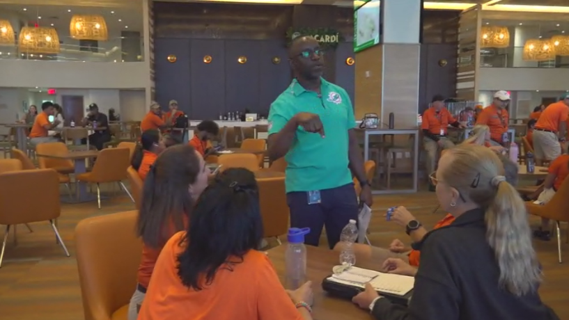 Miami Dade College professor finds his passion with side job at Hard Rock Stadium — CBS Miami, Coral Springs Arts news