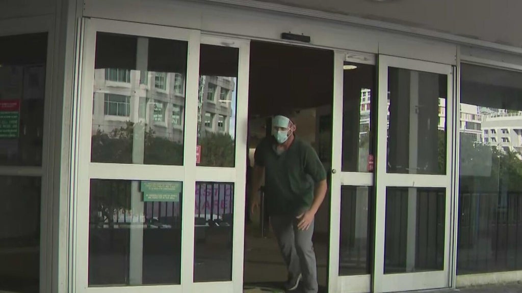 Suspended Broward officer runs out of jail after arrest for alleged identity theft on dead man — CBS Miami, Coral Springs Community news